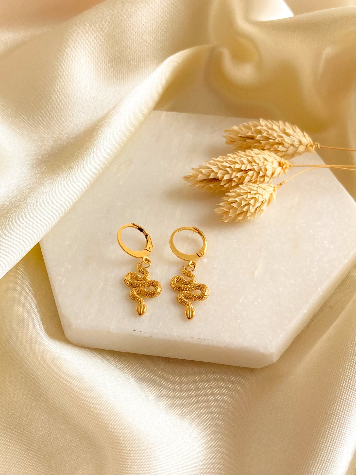 Snake oorbellen goud