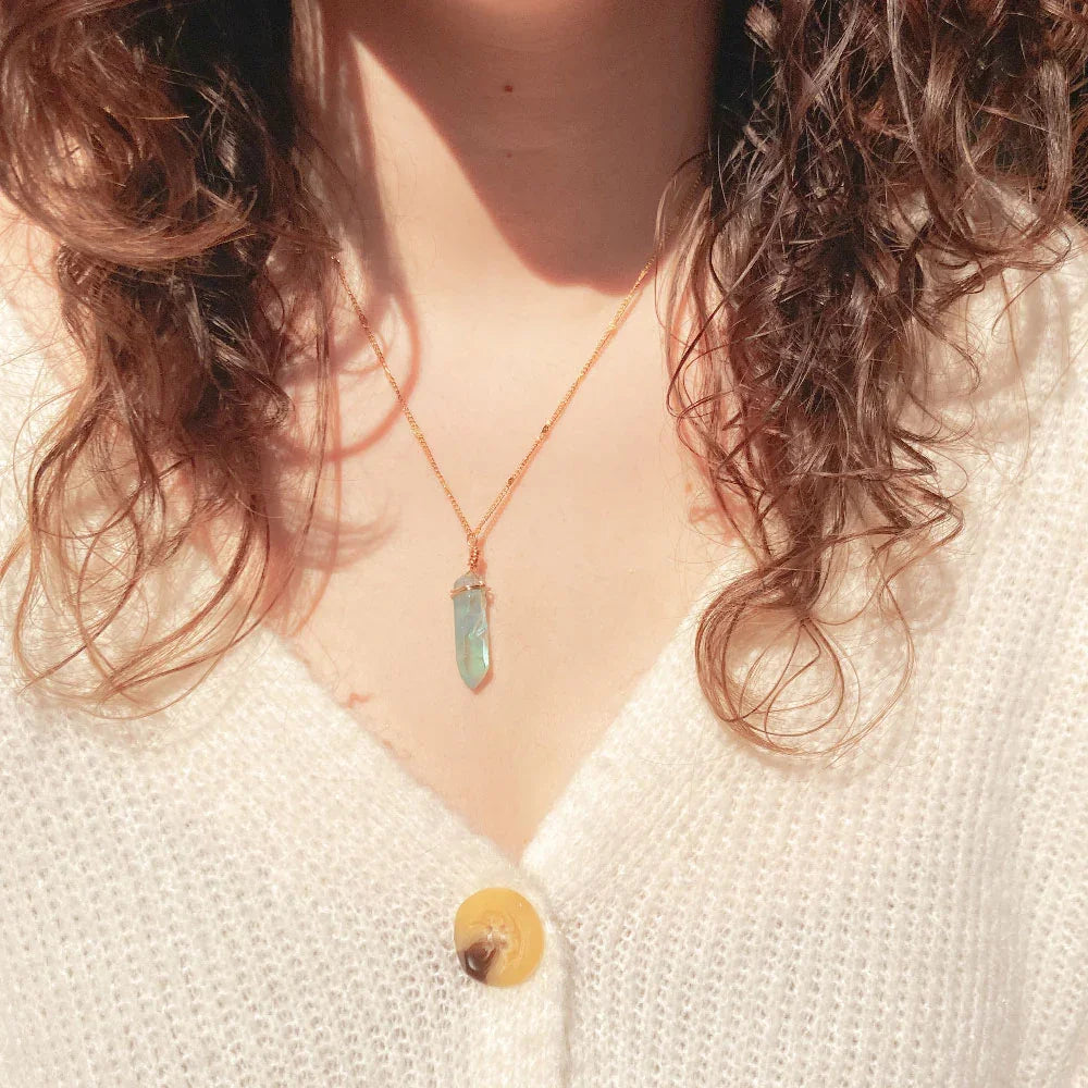 Bergkristal ketting blauw goud