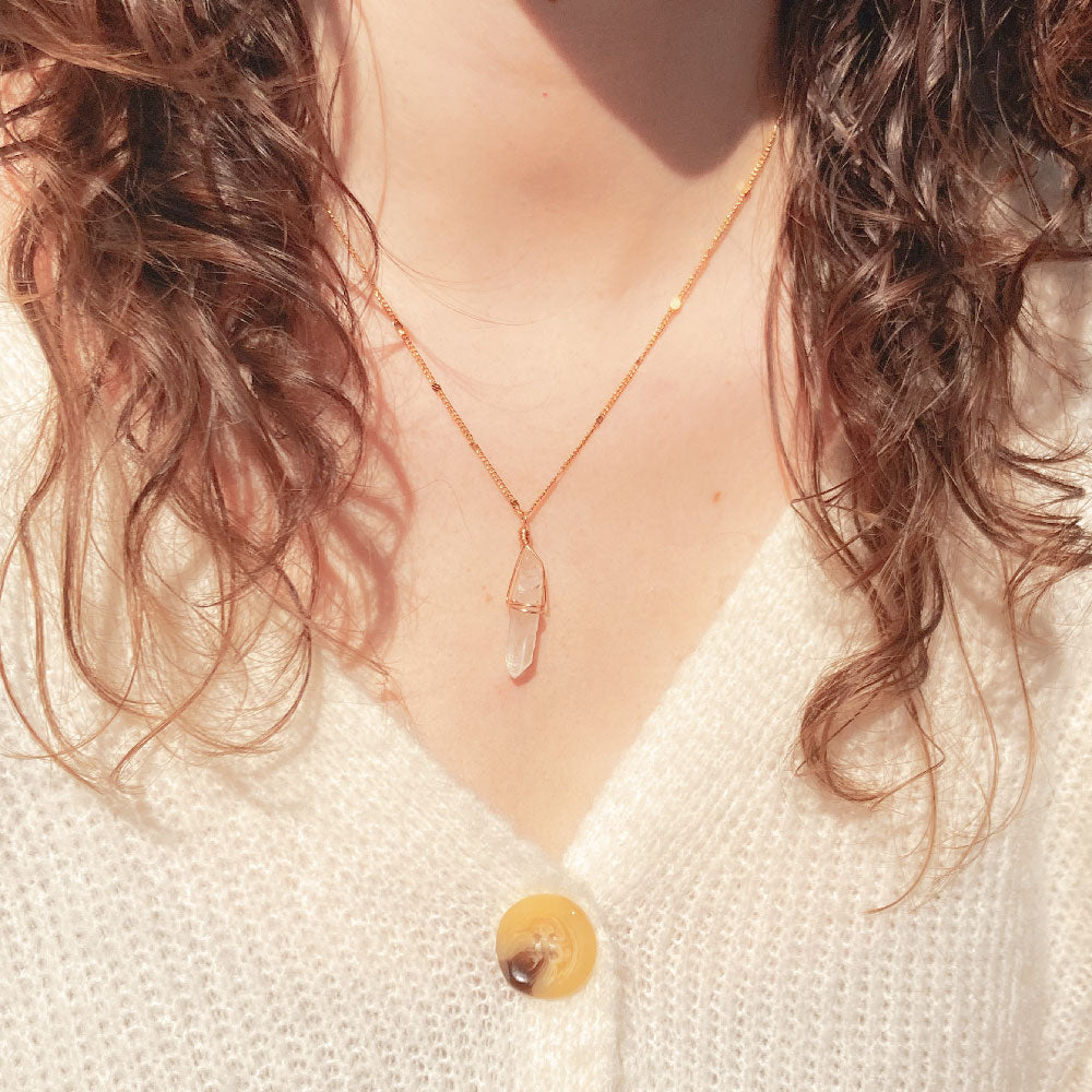Bergkristal ketting goud