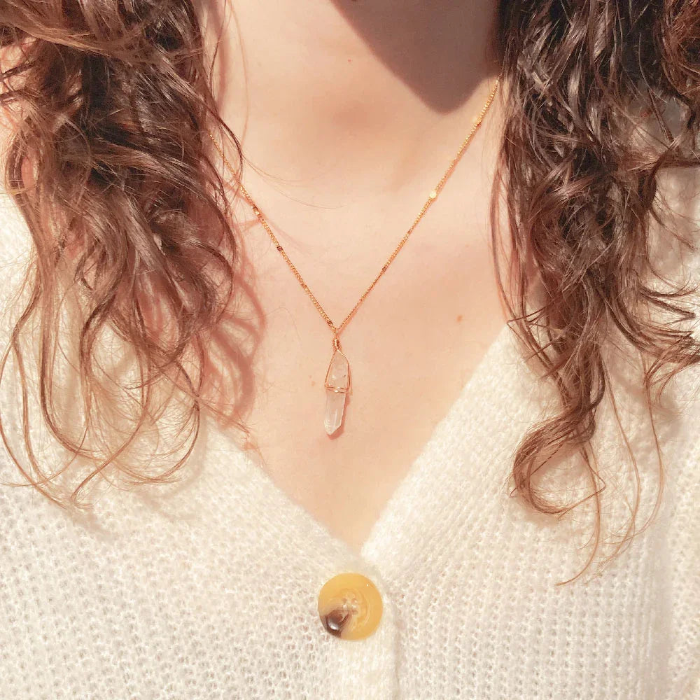 Bergkristal ketting goud