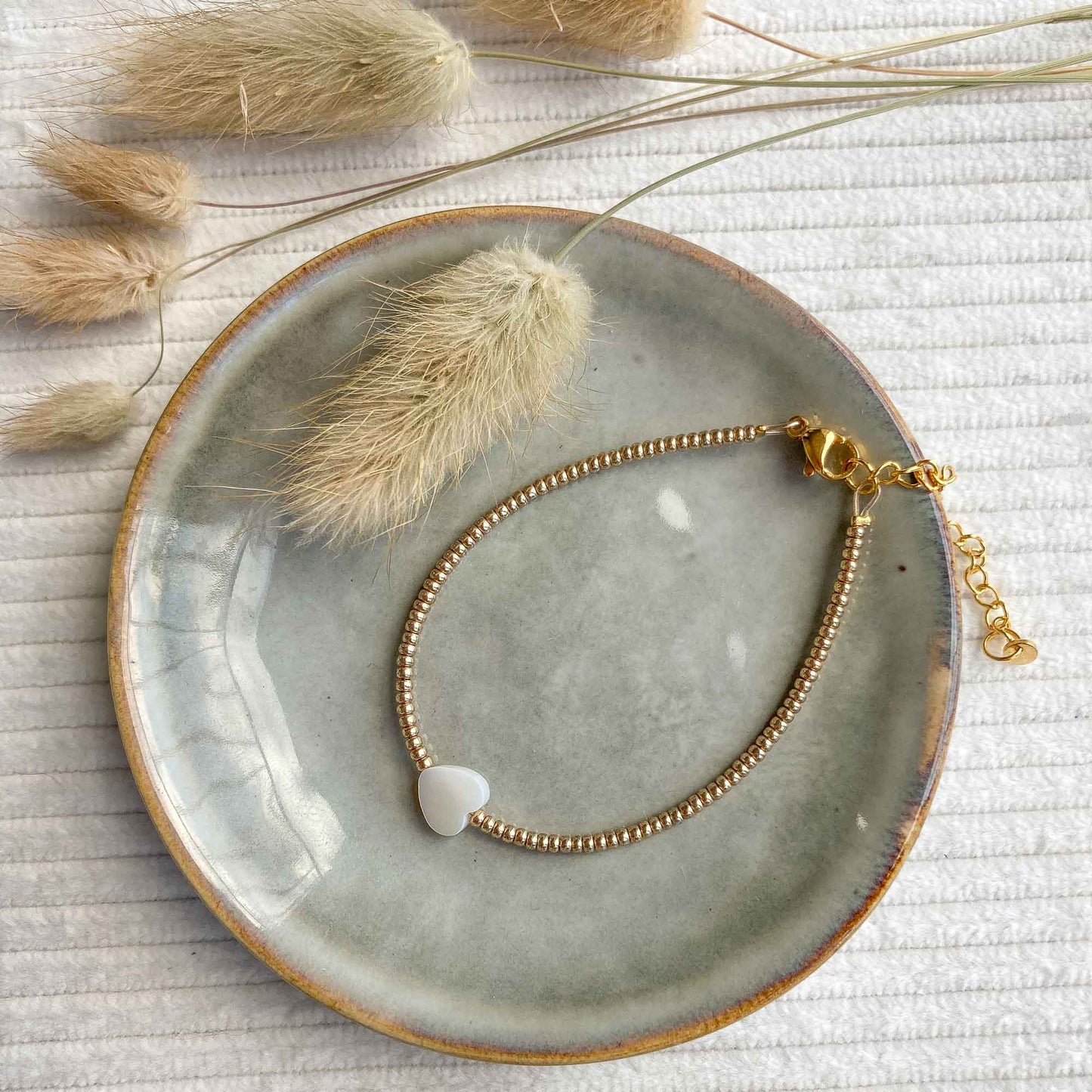 schelp hart armband goud