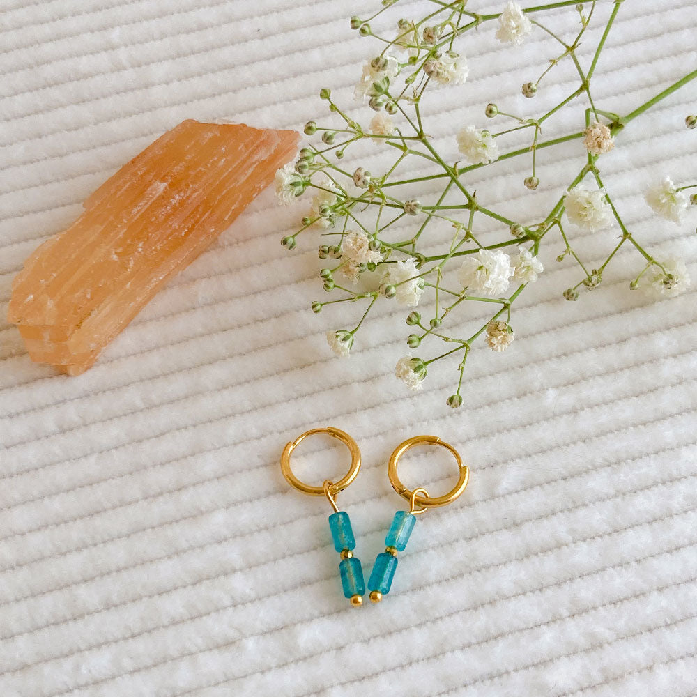 Bergkristal tube oorbellen goud blauw