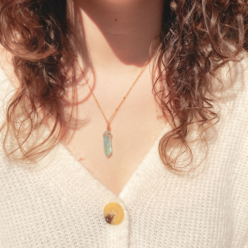 Bergkristal ketting blauw goud