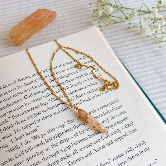 Bergkristal ketting goud oranje