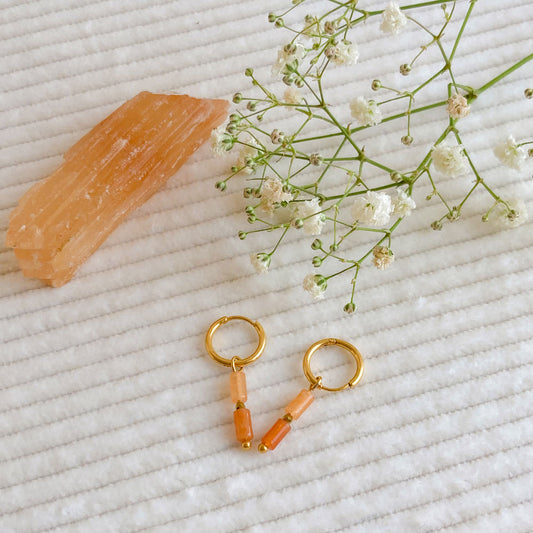 Bergkristal tube oorbellen goud oranje